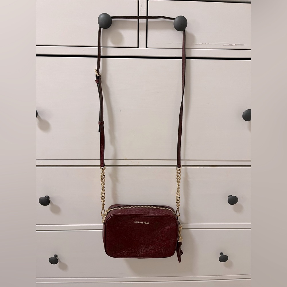 Michael Kors crossbody bag. Maroon colored. New.